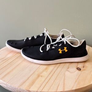 Under Armour Black Athletic Shoes with Yellow Logo